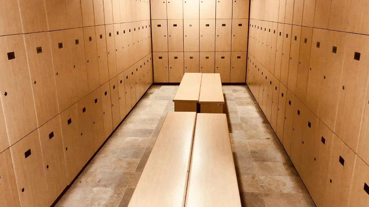 Empty wooden benches in a changing room